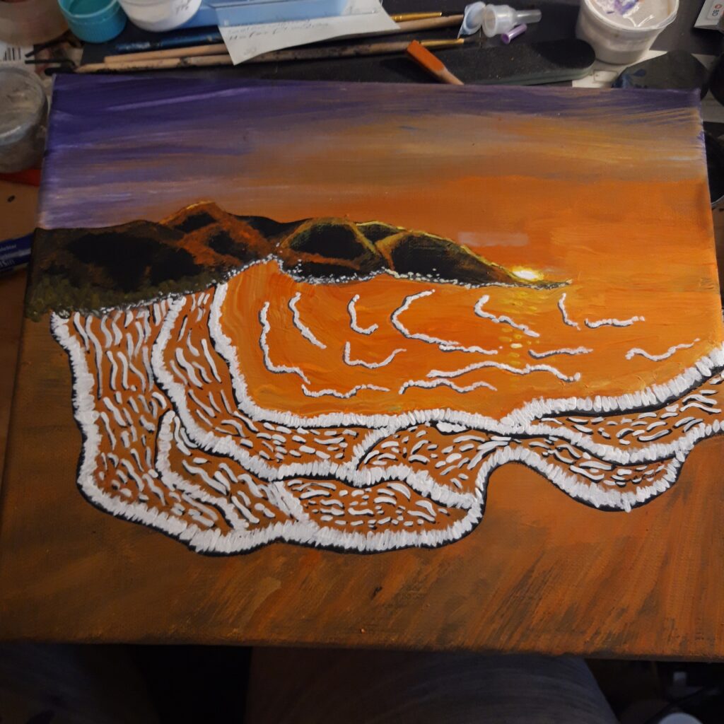 Sonnenuntergang über dem Meer und Strand