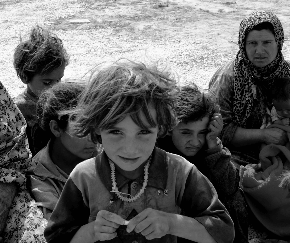 Flüchtlinge, vorne ein kleines Mädchen